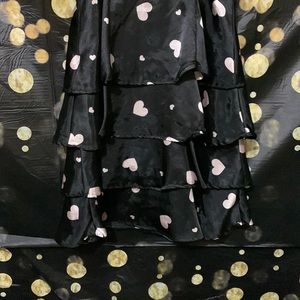 This dress is by Justice size 12